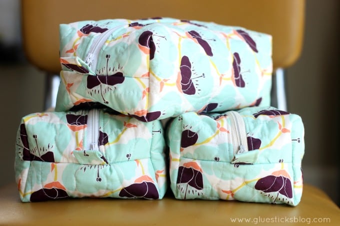 3 boxed zipper pouches with floral fabric