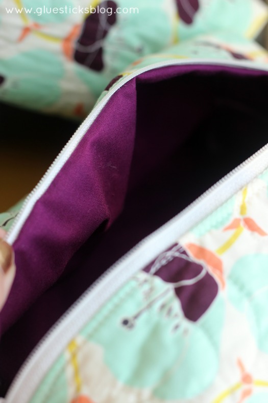 open pouch with purple lining showing