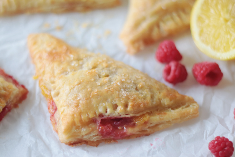 lemon raspberry turnover on parchment paper