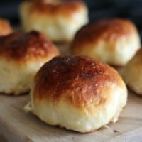 pretzel rolls on cutting board