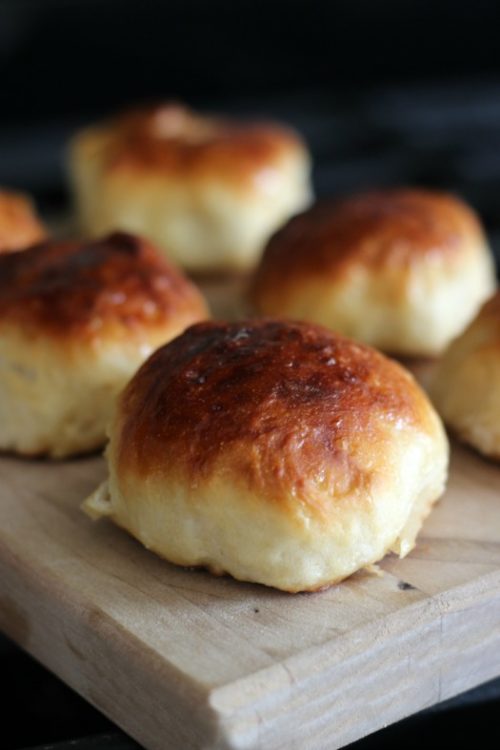 pretzel rolls on cutting board