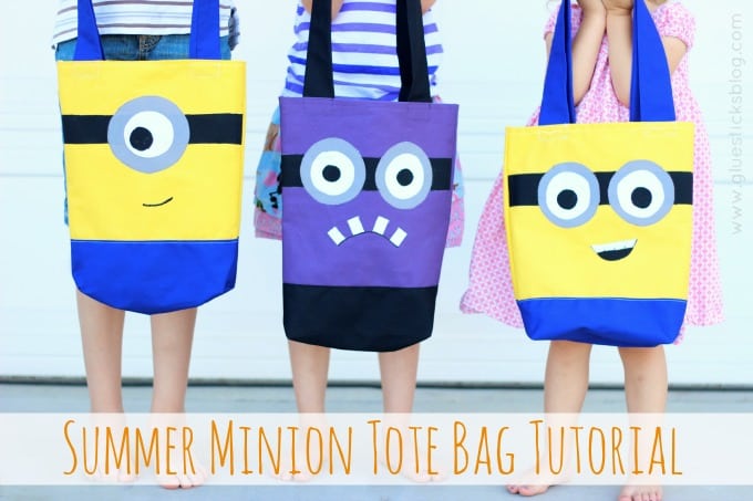 3 kids holding fabric minion totes