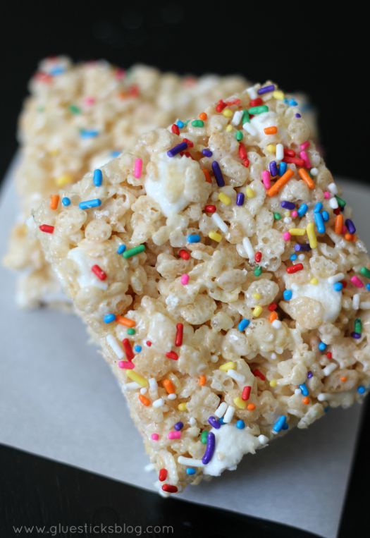 two rice krispies treats on parchment paper
