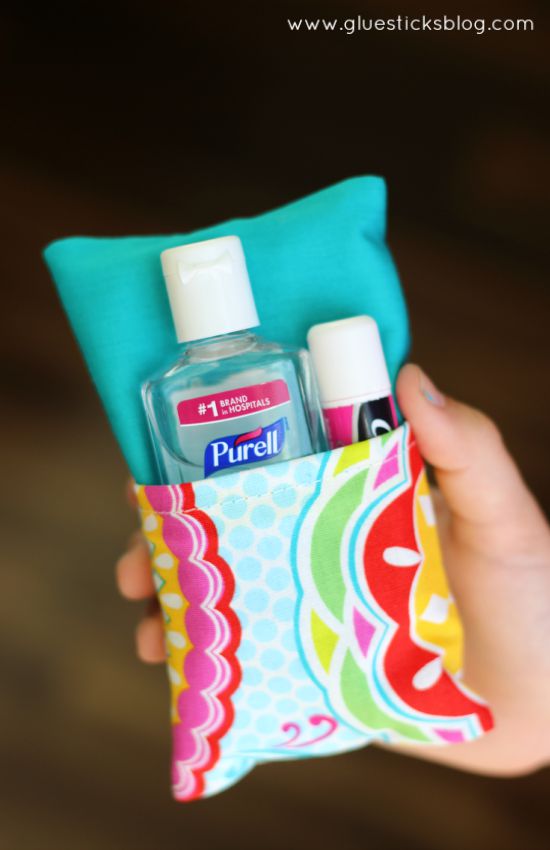 A 2 sided tissue holder pouch is perfect for cold and flu season. One side can hold a pack of tissues, the other side can hold a mini bottle of sanitizer and a lip gloss!