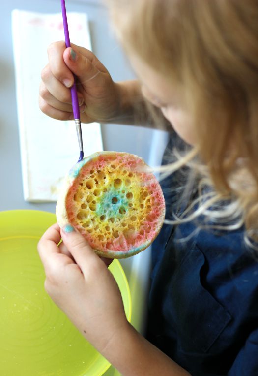 Tie Dyed Painted Toast is an art project and snack all in one! Add a few food coloring drops to milk then paint it onto your bread! When the bread has been toasted the paint will show up in bright and vivid colors and isn't soggy.