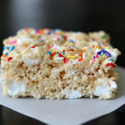 giant rice krispies treat on parchment paper