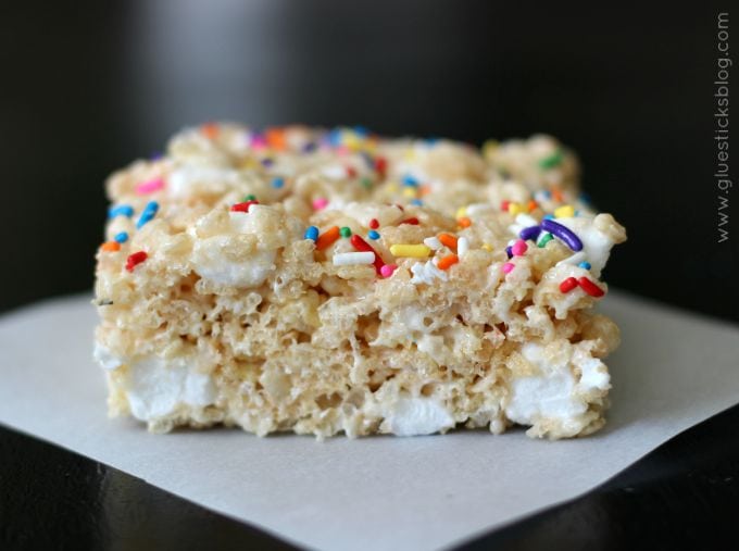 giant rice krispies treat on parchment paper