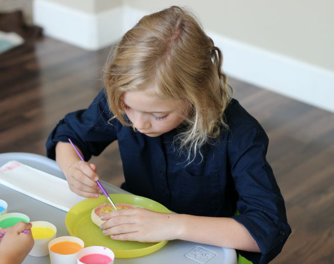 Tie Dyed Painted Toast is an art project and snack all in one! Add a few food coloring drops to milk then paint it onto your bread! When the bread has been toasted the paint will show up in bright and vivid colors and isn't soggy.