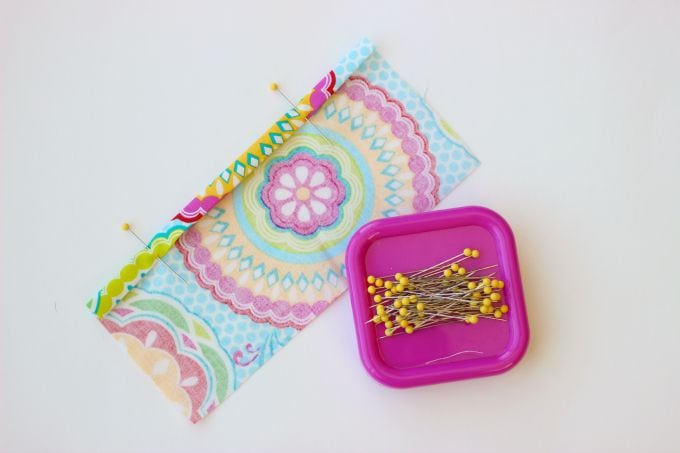 A 2 sided tissue holder pouch is perfect for cold and flu season. One side can hold a pack of tissues, the other side can hold a mini bottle of sanitizer and a lip gloss!