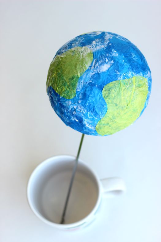 Tissue paper, a styrofoam ball, and a bit of glue is all you need to make a darling little globe craft. A fun craft for Earth Day or a solar system unit craft! Hang with a small hook and string from the ceiling for a fun way to display!