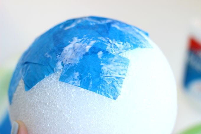 Tissue paper, a styrofoam ball, and a bit of glue is all you need to make a darling little globe craft. A fun craft for Earth Day or a solar system unit craft! Hang with a small hook and string from the ceiling for a fun way to display!
