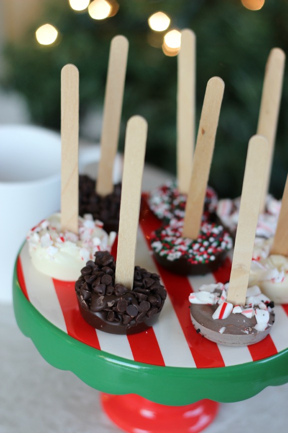 dessert stand with hot chocolate sticks
