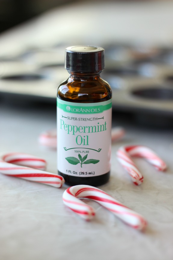 bottle of peppermint oil and mini candy canes