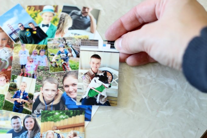 A photo collage canvas  is a great way to document the highlights of the year! Make one to display in your home and another to give to a grandparent. It makes a great gift and is simple to make. You can even print the photos directly from your phone or iPad. I'll show you how! 
