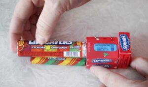 gluing boxes of nerds to gum and lifesavers for train