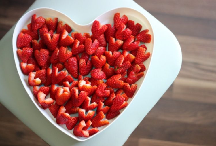 heart shaped platter full of heart strawberries