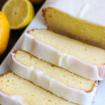 slices of easy lemon loaf cake on platter