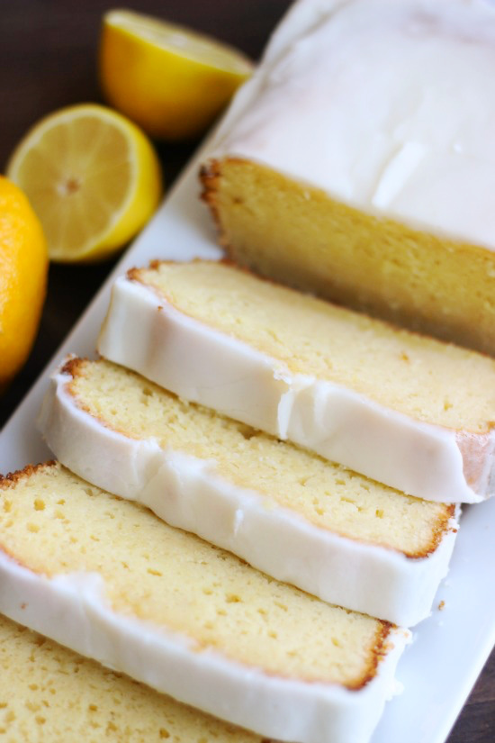 slices of easy lemon loaf cake on platter