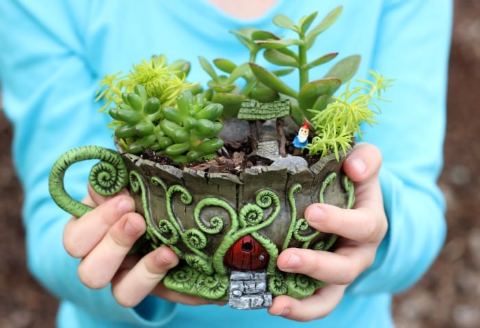 A whimsical fairy garden that will fit in the palm of your hand. This teacup fairy garden adds the perfect amount of magic to any windowsill or shelf!