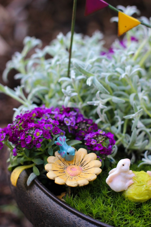 A darling fairy tale fairy garden, complete with a carriage! This little garden is what little girl dreams are made of. 