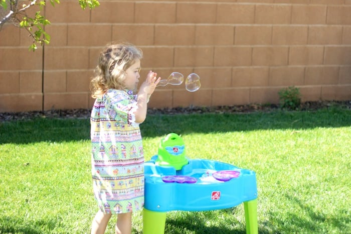 Make your own bubbles this summer with this 3 ingredient homemade bubble recipe. Simply combine water, dish soap, and glycerin! Fill up a large jug with homemade bubbles to have plenty on hand when spill happen, because they always do!