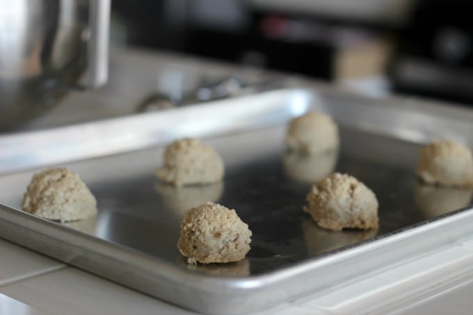 cookie dough on baking sheet, scooped ready to bake