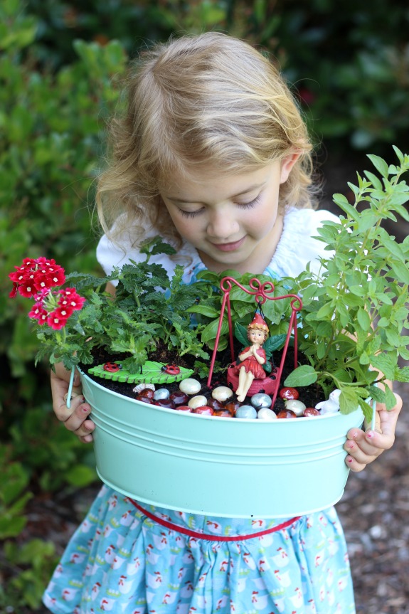 A kitchen herb fairy garden is as practical as it is pretty! Trim the leaves of the herbs off to use in recipes and watch the flowers bloom. Such a fun way to brighten up the kitchen.