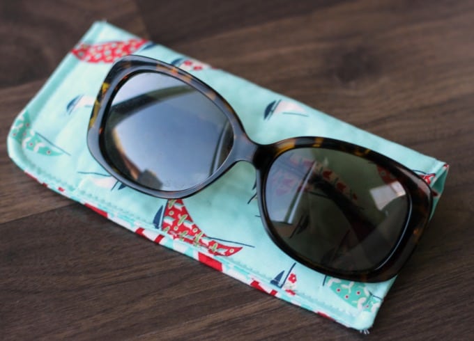 sunglasses resting on sunglasses case