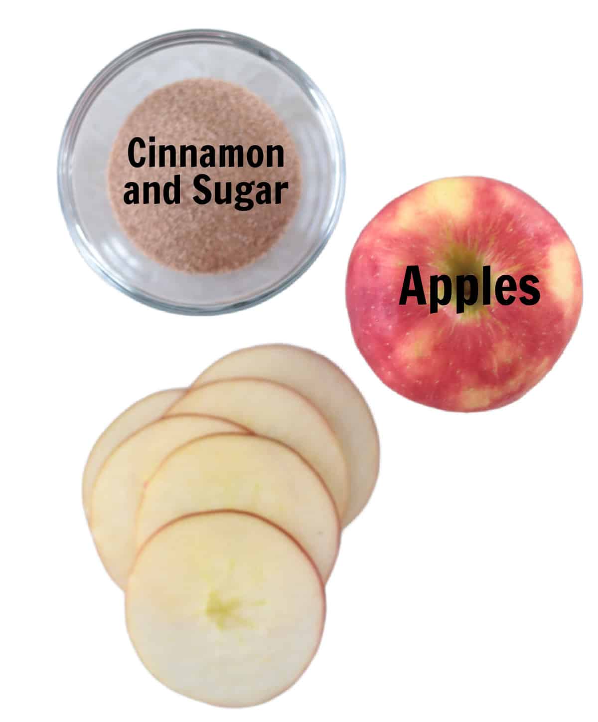 Bowl of cinnamon and sugar, red apple, and pile of apple slices.
