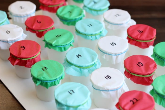 cups with tissue circles wrapped around