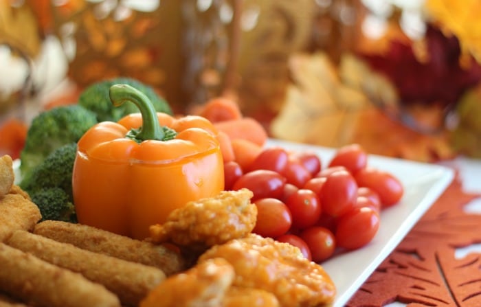 This Thanksgiving Appetizer platter with homemade cool dill dip comes together in about 20 minutes! An orange bell pepper resembles a pumpkin to make this offering even more festive. 
