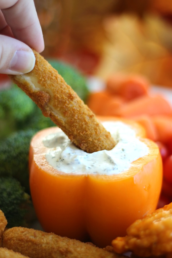 This Thanksgiving Appetizer platter with homemade cool dill dip comes together in about 20 minutes! An orange bell pepper resembles a pumpkin to make this offering even more festive. 