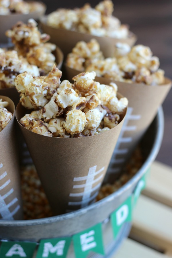 Always a crowd pleaser, this chocolate caramel popcorn is easy to make and very addicting. Make a batch for your next party. Also a simple tutorial for popcorn cones (holders). 