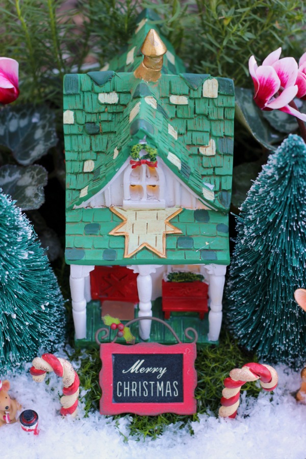 A beautiful Christmas fairy garden to brighten your porch or home this holiday season! Get the kids involved for a magical project that will last all season!