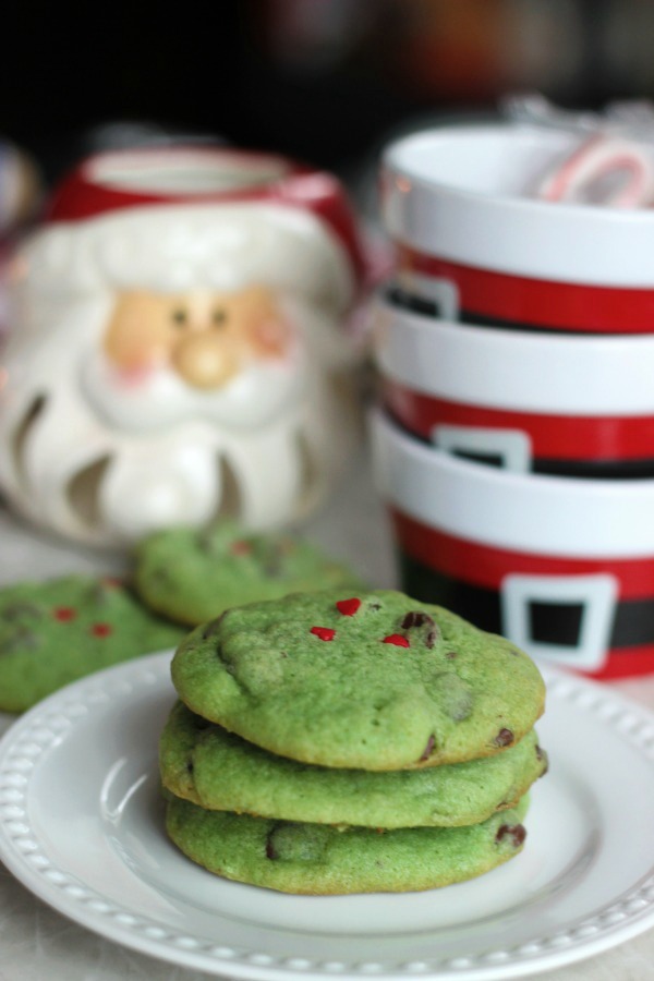 Peppermint extract, chocolate chips, heart sprinkles, and green cookie dough combine to create...GRINCH cookies! These are sure to be a hit at any holiday gathering this year!