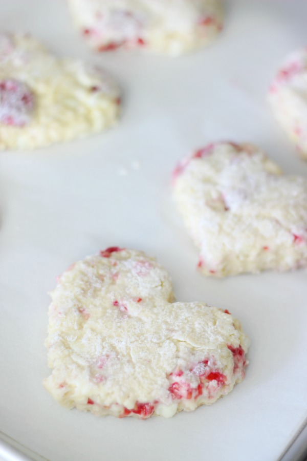 raspberry scones on baking sheet