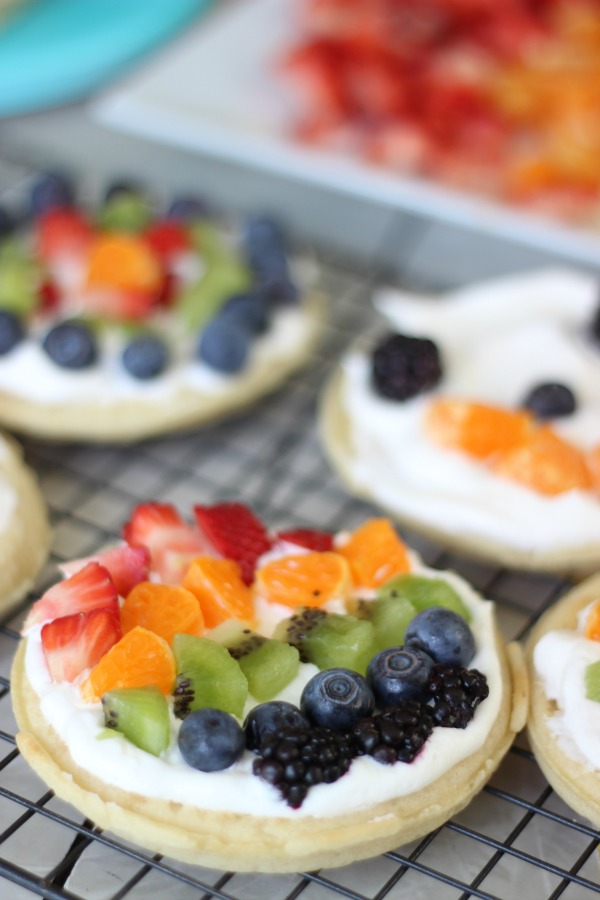 A delicious fruit waffle bar that is as colorful as the rainbow! Fresh fruit, cream, and waffles combine for the perfect St. Patrick's Day breakfast (or dinner!) that the whole family will love. 