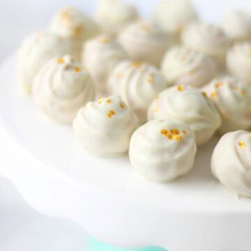 white chocolate truffles on cake stand