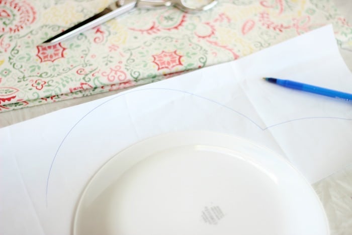 Add a pop of color to your table this spring with a DIY table runner! A quick and easy beginning sewing project. Use coordinating fabrics for a reversible runner!