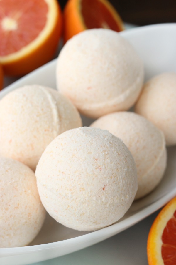 orange bath bombs in bowl