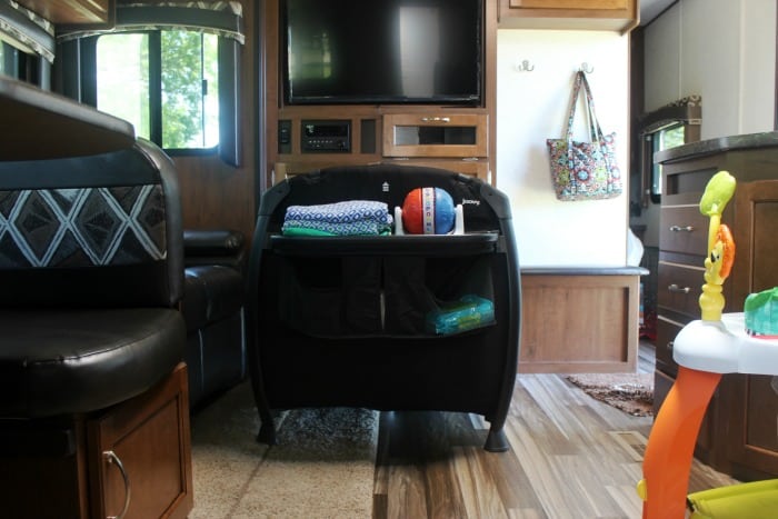 The perfect RV travel nursery for baby! It is compact, easy to fold and store, comes with a diaper station, bassinet insert, and lots of storage!  A great option for a summer on the road.