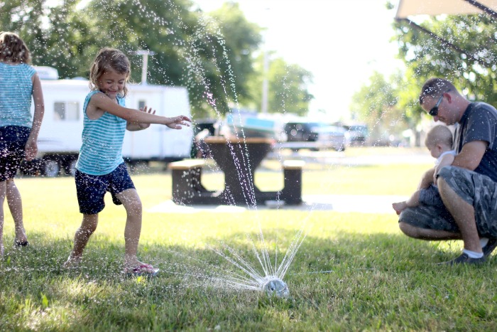 What can you make with a 2-liter soda bottle and some tape? Why, the best homemade soda bottle sprinkler around, that's what! 