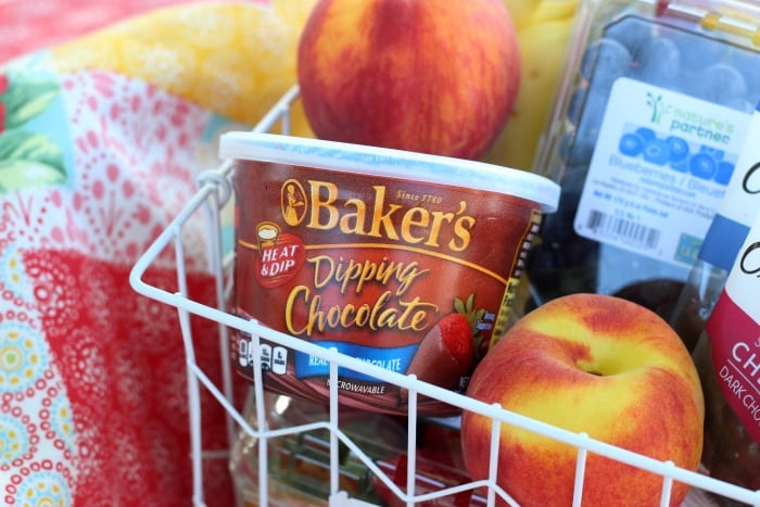 A fresh fruit and chocolate gift basket perfect for summer giving! Not your typical fruit basket either. Strawberries, raspberries, blueberries, bananas & peaches. Tucked inside a basket with dipping chocolate! The perfect gift for a teacher!