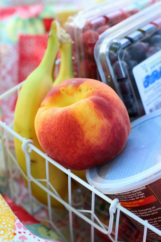 A fresh fruit and chocolate gift basket perfect for summer giving! Not your typical fruit basket either. Strawberries, raspberries, blueberries, bananas & peaches. Tucked inside a basket with dipping chocolate! The perfect gift for a teacher!