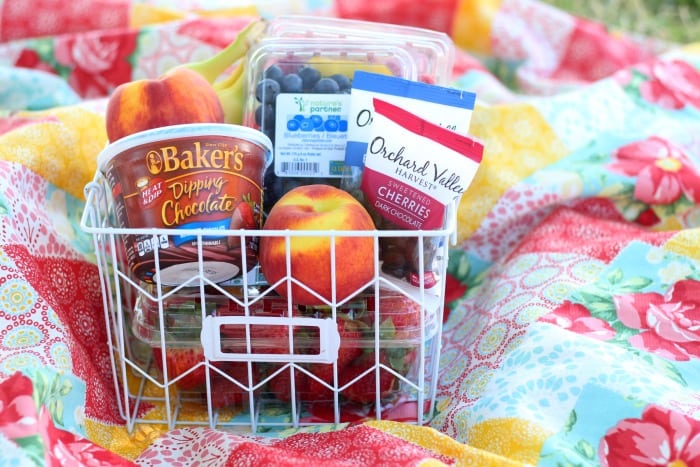 A fresh fruit and chocolate gift basket perfect for summer giving! Not your typical fruit basket either. Strawberries, raspberries, blueberries, bananas & peaches. Tucked inside a basket with dipping chocolate! The perfect gift for a teacher!