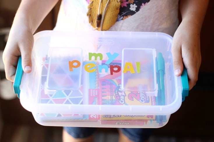 plastic pen pal kit with stickers on top