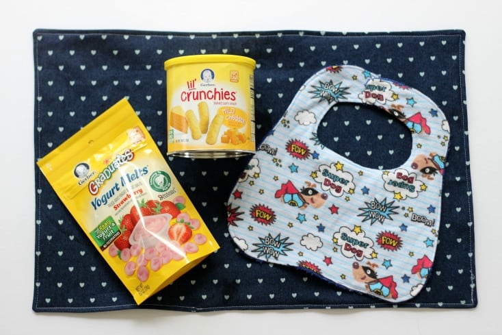 Make a bib out of a washcloth and a placemat in 30 minutes to catch spills from the messy little ones in your home! Two easy sewing projects for beginners!