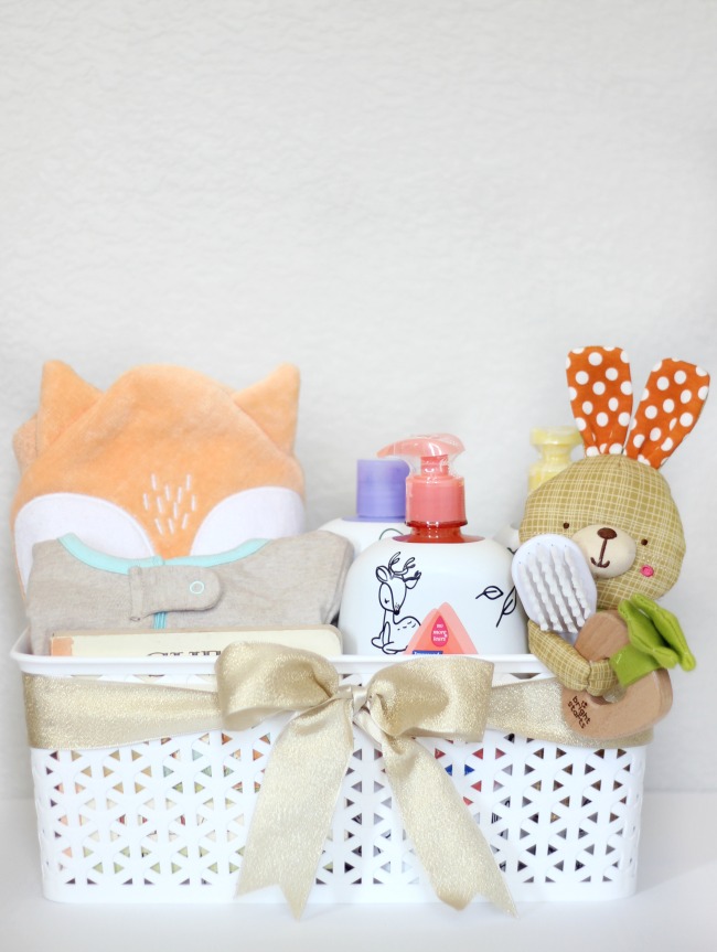 A soothing baby bedtime bath kit with everything needed to wind down at the end of the day. A cozy towel, pajamas, a bedtime story, favorite toy, and a variety of soothing baby bath products all tucked inside a nursery basket for easy gift giving and future storage.