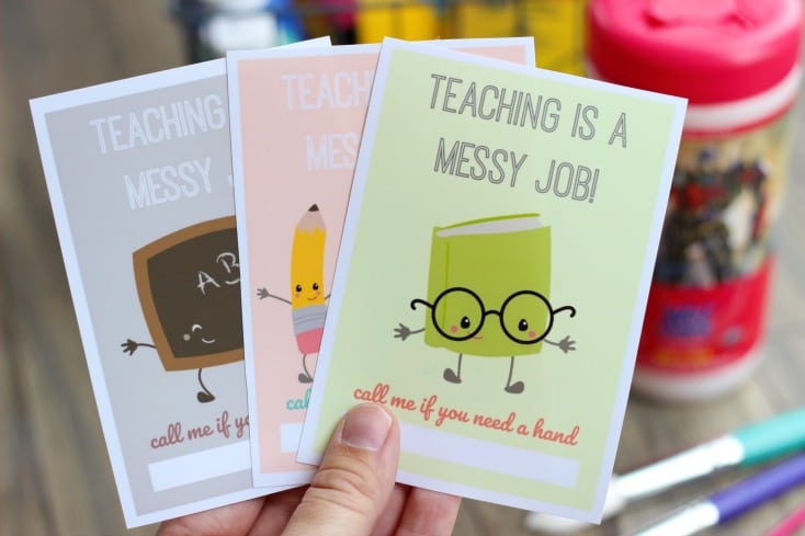 A cute and practical back to school gift idea for the classroom. Let your child's teacher know that they can count on you for help during the school year by attaching this darling printable to a container of hand wipes or a bottle of hand sanitizer! 