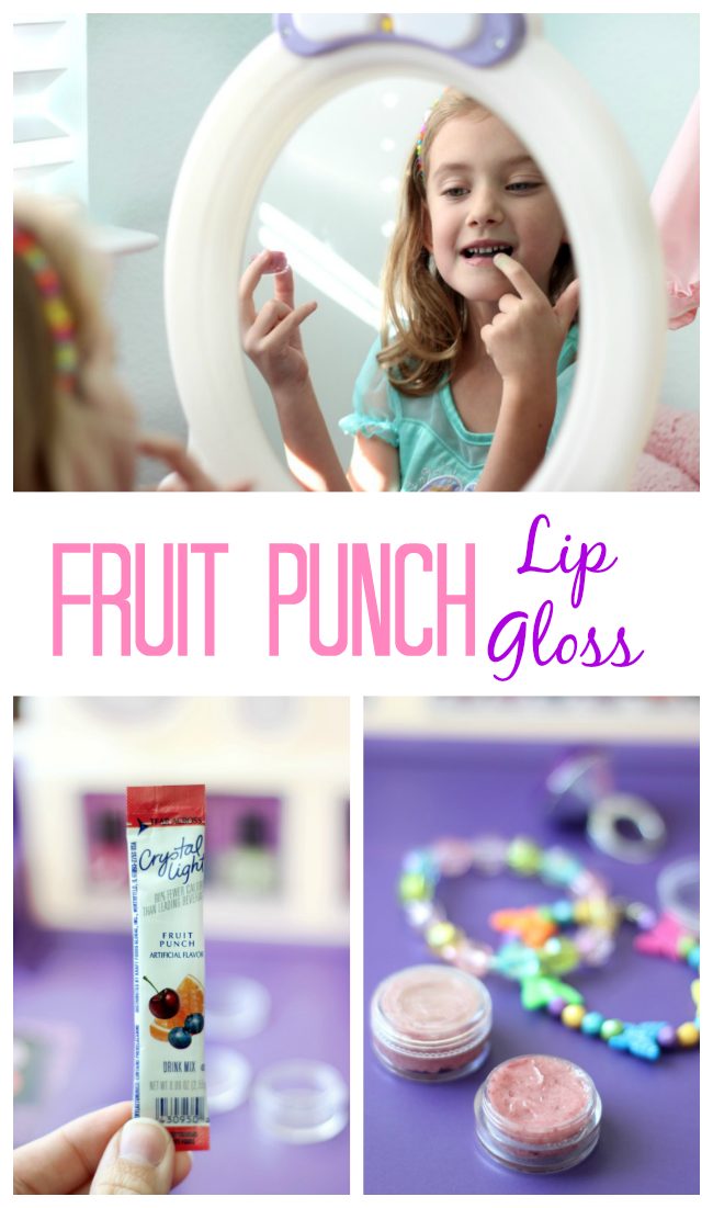 Homemade lip gloss with only 2 ingredients! This fruit punch lip gloss smells delicious and is such an easy project to make with kids. You can make any flavor you'd like by switching up the flavor of drink packets.